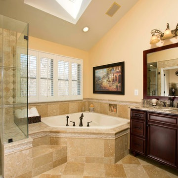 Dual Vanities, Elegant Stone Highlight Spa-Like Bath Remodel