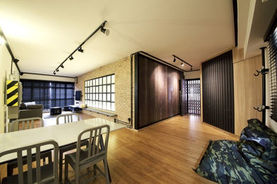 Inspiration for an industrial dining room remodel in Singapore