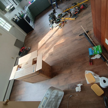 Replace 3 bathrooms and Redo 3 rooms of flooring