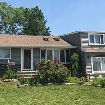 Hicksville Siding - Storm Clapboard Siding with Versetta Sterling Ledgestone