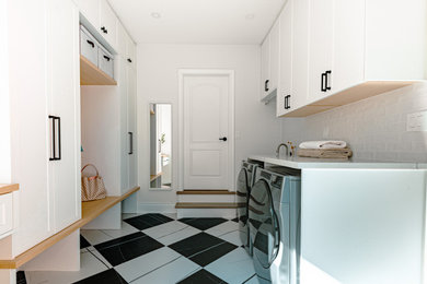 Laundry room - transitional laundry room idea in Toronto