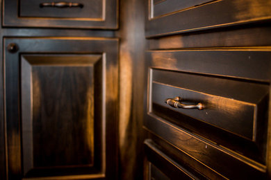 Inspiration for a rustic home bar remodel in Cleveland