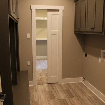 Laundry / mud room with access to master closet