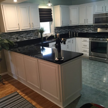 cabinet refacing with backsplash