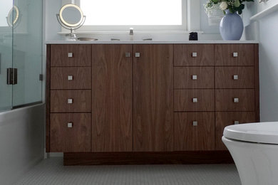 Inspiration for a small traditional master bathroom in Portland with flat-panel cabinets, dark wood cabinets, a freestanding tub, a shower/bathtub combo, a wall-mount toilet, blue walls, ceramic floors, an undermount sink, quartzite benchtops, white floor, a hinged shower door and white benchtops.