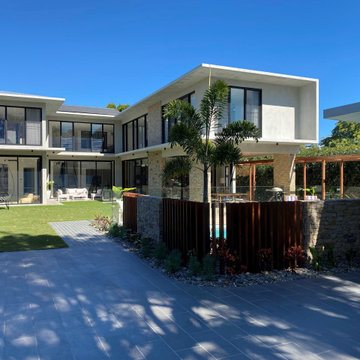 The exterior of this stunning Brisbane home. The EzyReveal steel window reveals