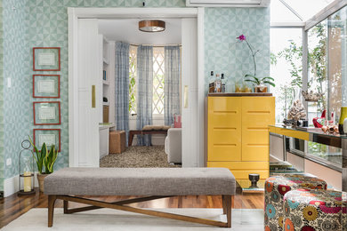 Inspiration for a large timeless formal and enclosed dark wood floor living room remodel in Other with multicolored walls, no fireplace and a wall-mounted tv
