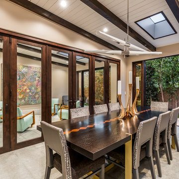 Interior Bi-Fold Doors Separate Formal Sitting Room from Dining Room