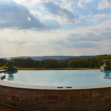 Infinity edge pool with underground grotto