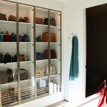 Glass-Front Display Cabinetry in Primary Dressing Room