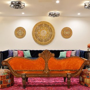 This is an example of a medium sized mediterranean formal enclosed living room in Miami with white walls, light hardwood flooring, no fireplace, no tv and beige floors.