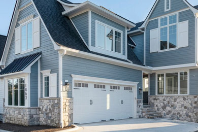 Inspiration for a transitional blue exterior home remodel in Detroit