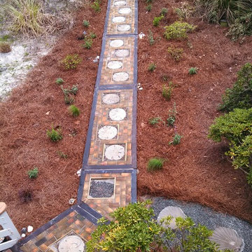 Reclaimed Boardwalk Material turned Mosaic Path