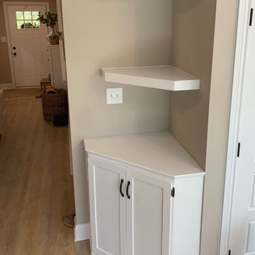 Custom corner cabinet with floating shelves
