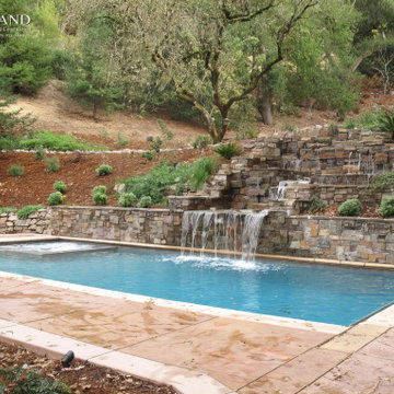 Moraga, Merrell Circle. Swimming Pool on a Hillside with a Waterfall