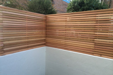 Urban Gardens with Contemporary Slatted Fencing