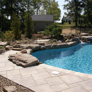 Pool oasis with stream and waterfall