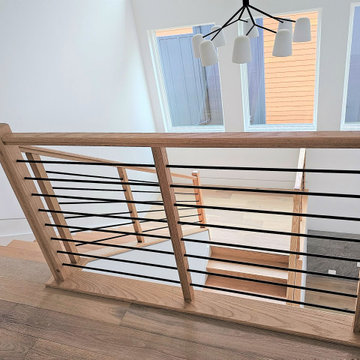 Project #108 | Red Oak Staircase in Light-Filled Space