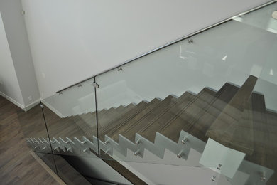 Mid-sized minimalist wooden straight open staircase photo in Edmonton