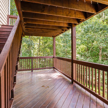 Backyard Deck Landing with Wood Railings and Stair Access