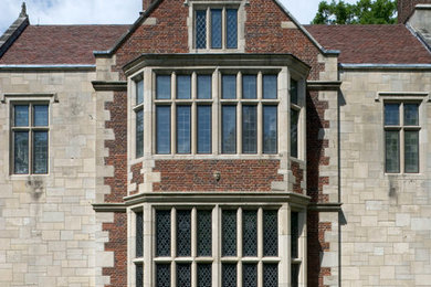 Inspiration for a timeless stone exterior home remodel in Other