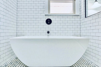 Large trendy master porcelain tile and beige floor bathroom photo in Nashville with open cabinets, white cabinets, a two-piece toilet, white walls, an undermount sink, marble countertops, a hinged shower door and white countertops