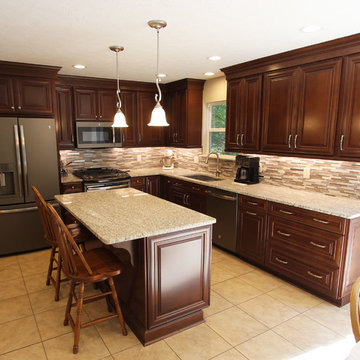 Waypoint Cherry Chocolate Cabinets and Giallo Ornamental Granite Countertops