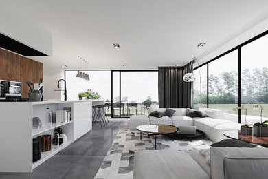 Réalisation d'un grand salon design ouvert avec un bar de salon, un mur blanc et sol en béton ciré.