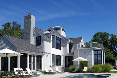 Example of a beach style home design design in New York