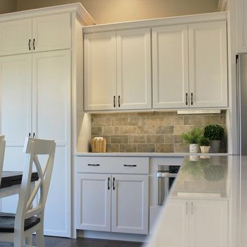 Blue Kitchen Island in Edgebrooke Homes Bettendorf, Iowa Kitchen