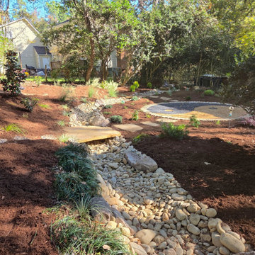 Yin-yang meditation garden with dry creek bed