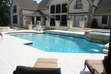 Hot tub - large transitional backyard custom-shaped hot tub idea in Dallas