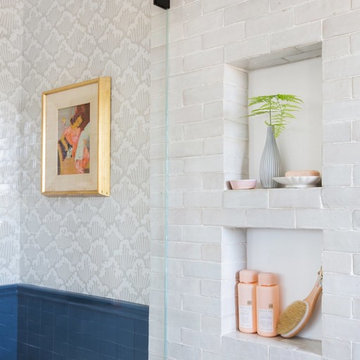 emily henderson's classic modern master bathroom with weathered white subway