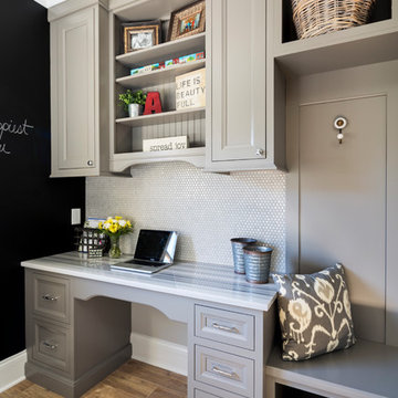 Customized Laundry/Mud Room with Desk, Utility Sink, and Storage Solutions