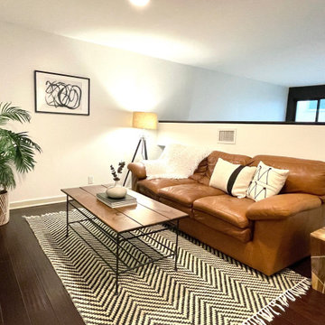 Blending client furniture with Eleven art, rug, tree, etc.