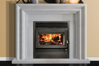 Example of a classic formal and open concept living room design in Other with a standard fireplace, a concrete fireplace and no tv