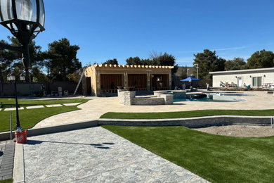 Elegant Travertine Pathway Leading to Luxury Pool Area