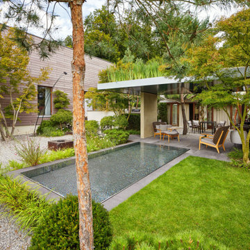 Gartengestaltung Bern – Wohngarten it Pool und Waldatmosphäre