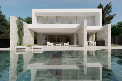 Modelo de fachada de casa blanca mediterránea grande de dos plantas