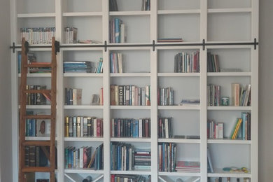 Example of a small minimalist loft-style family room design in DC Metro
