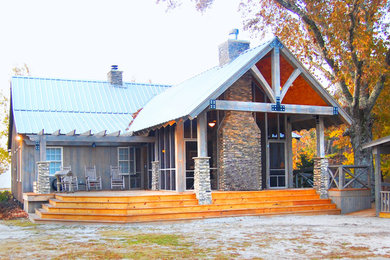 Example of a country exterior home design in Other