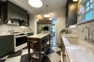 Inspiration for a small victorian galley eat-in kitchen remodel in Calgary with a double-bowl sink, shaker cabinets, green cabinets, quartzite countertops, green backsplash, white appliances, an island and green countertops