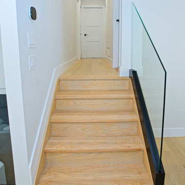 White-Oak Stair Treads with Frameless Glass Guard Panels | North York