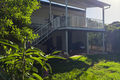 Photo of a contemporary home design in Sunshine Coast.