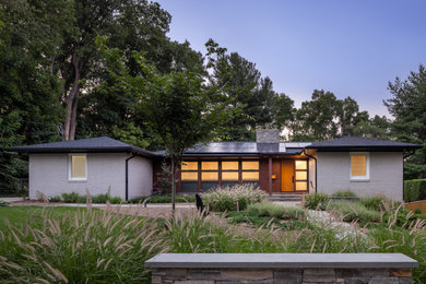 Inspiration for a mid-century modern exterior home remodel in DC Metro
