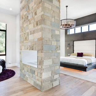 75 Beautiful Beige Bedroom With A Two Sided Fireplace