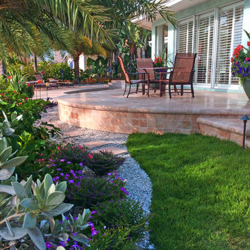 Backyard transformation features a new Travertine deck
