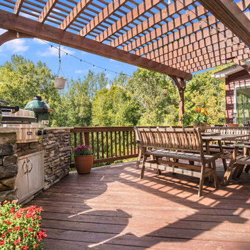 Outdoor Dining Deck with Pergola and Built-In Grill Station