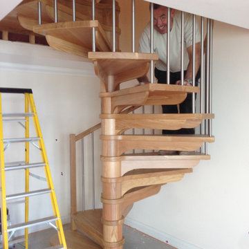 Installing a small Oak spiral staircase for a seafront apartment in Falmouth.