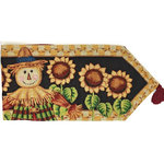 Tache Home Fashion - Fall Vintage Woven Tapestry Sunflower Field Scarecrow Table Runner, 13x90 - Liven up your dining tables and kitchen space with these bright and festive linens to fill your home with the holiday spirit. This table runner features a happy scarecrow in the center surrounded by golden sunflowers with a black background and a beige checkered border around the picture. The back of the table runner is a solid red to compliment the front. Features a red tassel at the end of the runner.